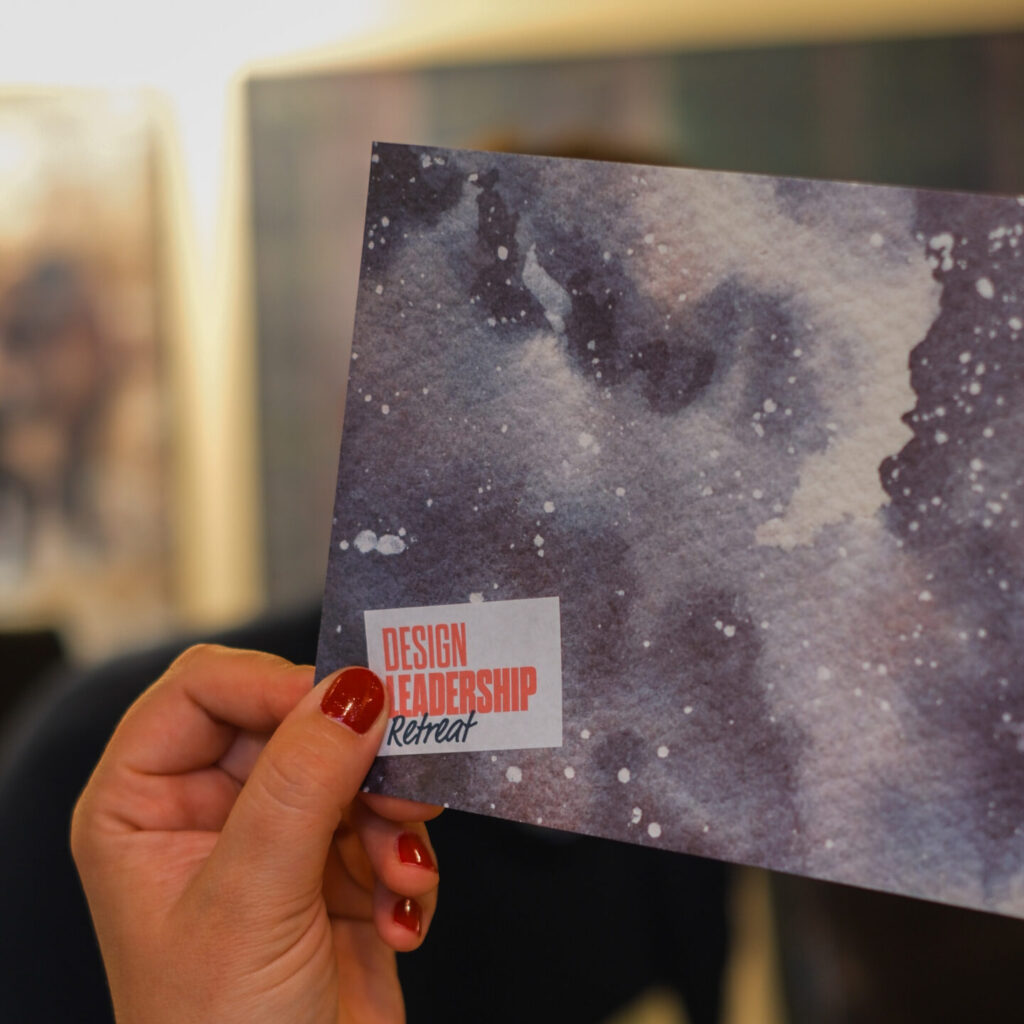 woman holding a card